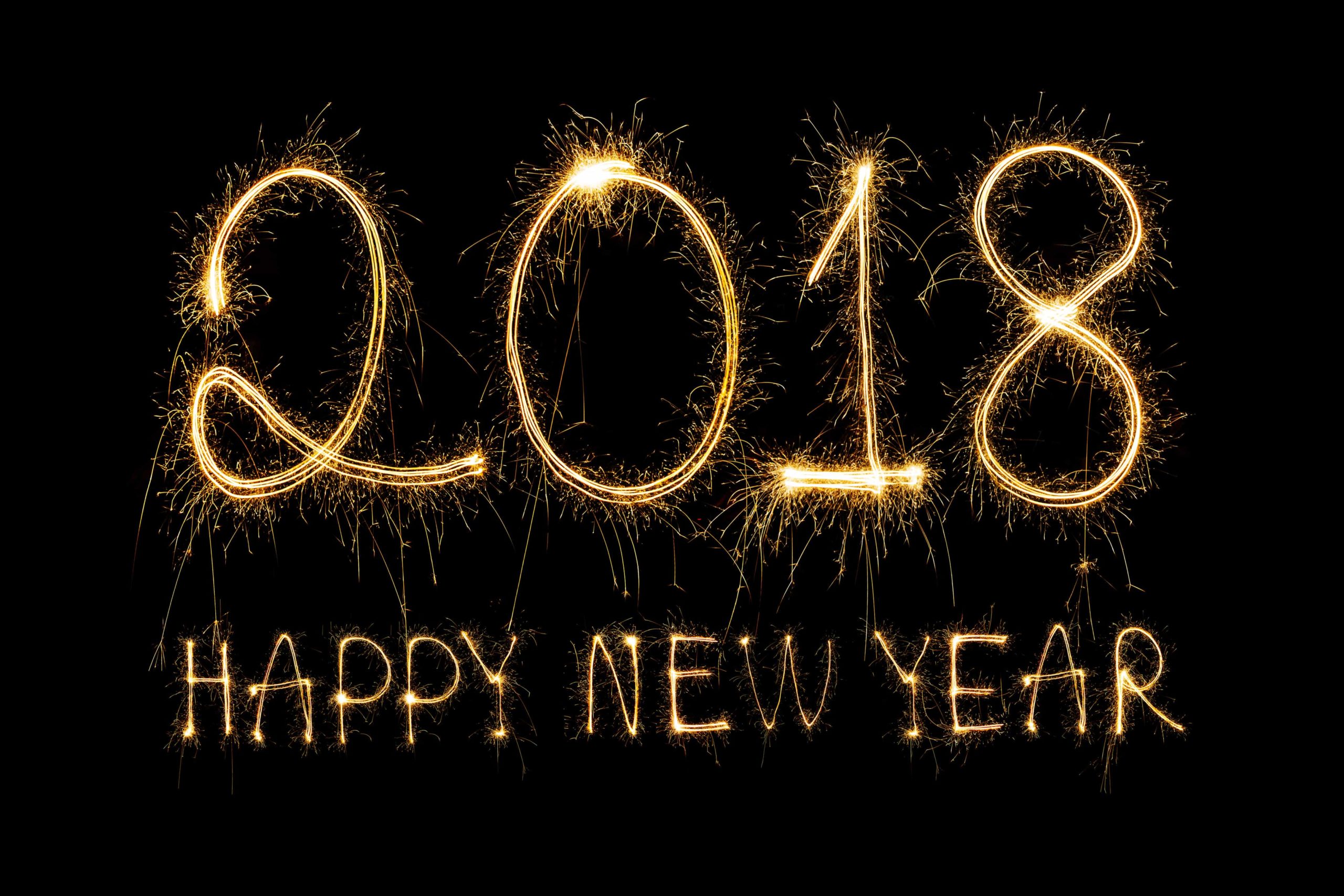 2018-written-with-sparkle-firework-happy-new-year-min